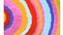 Stylish vibrant multicolor round rugs with saffron orange, key lime green, light blue, red, warm pink and dark blue rings.