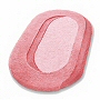 oval bathroom rug with beautiful sculpted pile in palm green, pink, peach and beige